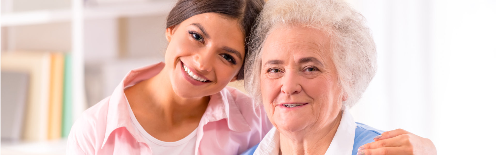 caregiver and her patient smiling